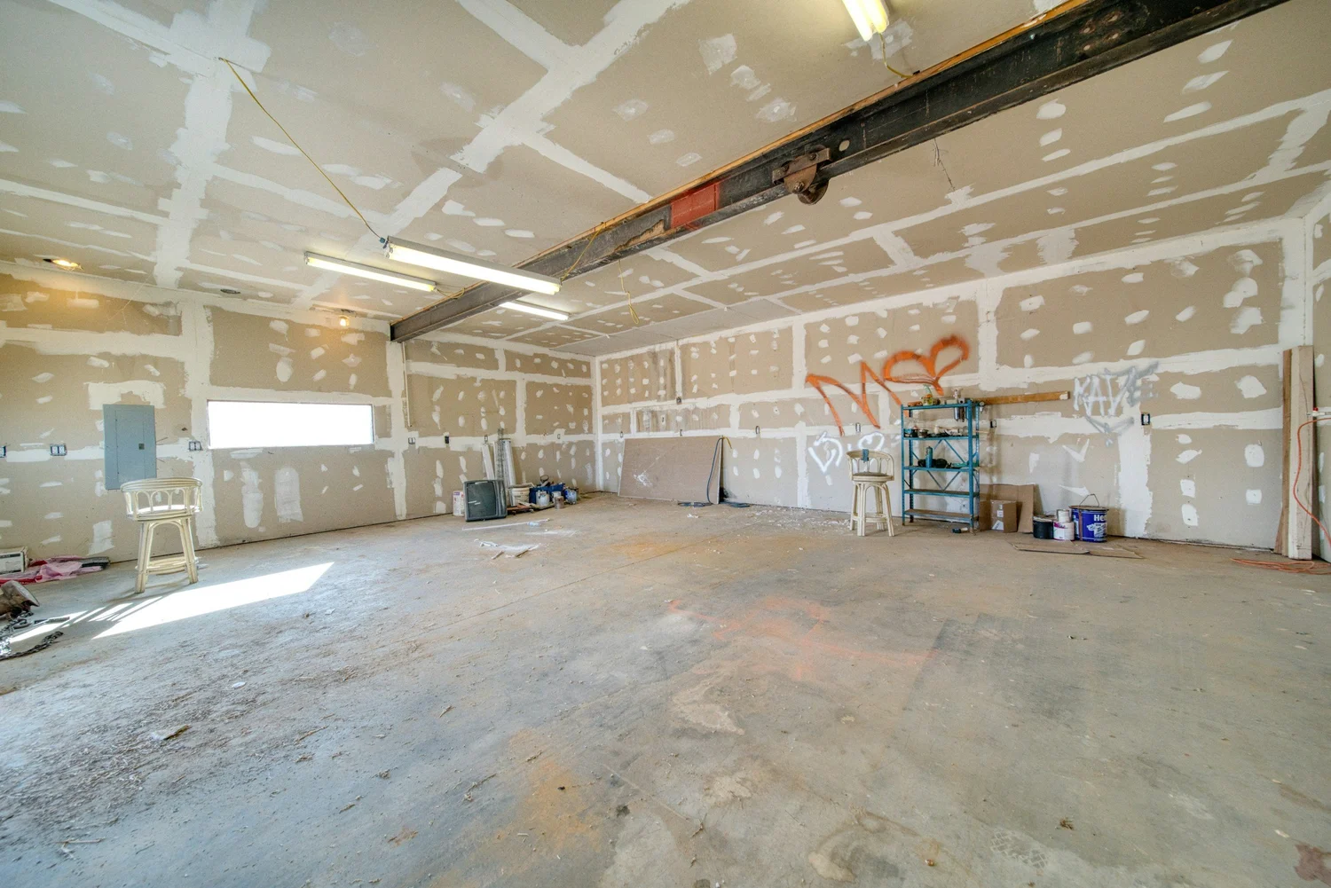 Drywall being hung in a commercial space